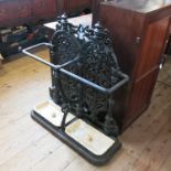 A Coalbrookdale wrought iron double stick stand, with scroll decoration, af