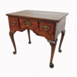 A 18th century design walnut low boy, with cross banded decoration, fitted with three frieze drawers