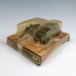 A Dinky Toys Volkswagen KDF and 50mm P.A.K Anti-Tank Gun, cased, number 617