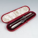 A cased pair of silver lobster picks, Sheffield 1909, weight 1oz
