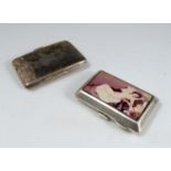 A silver and enamel cigarette case, of rectangular form, decorated with a reclining female nude,