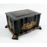 A 19th century black papier mache tea caddy, of shaped rectangular form, the exterior decorated in