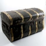 An 18th century leather and brass bound trunk