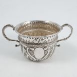 A silver Britannia standard two handled bowl, with gadrooned and fluted decoration, London 1899,
