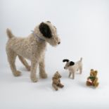Two plush models, of terriers, height 15ins and 6ins, together with a Hermann plush teddy bear and