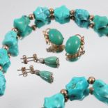 A row of tumbled turquoise, with yellow beads between, and a pair of turquoise earclips, and a