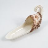 A 19th century Royal Worcester cigar holder, formed as a bearded man with gaping mouth, dated