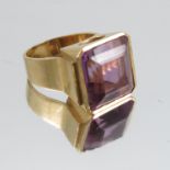 An amethyst single stone ring, stamped '18ct', the stone approximately 1.5cm square, finger size