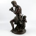 Coustou, a bronze model, of Pan, playing a pipe with a child, height 14.75insCondition Report: No