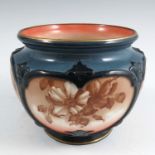 A Hadleys Worcester quarter lobed cache pot, decorated with sepia panels of flowers, height 4.