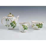 A Worcester bachelor's tea set, decorated in the Blind Earl pattern, comprising teapot, milk jug,
