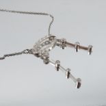 A diamond negligee pendant, the open circle of rose cuts with two knife edge suspensions below,