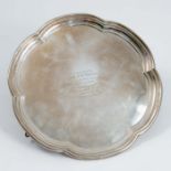 A silver salver, of shaped circular form, with presentation inscription to the centre, Sheffield