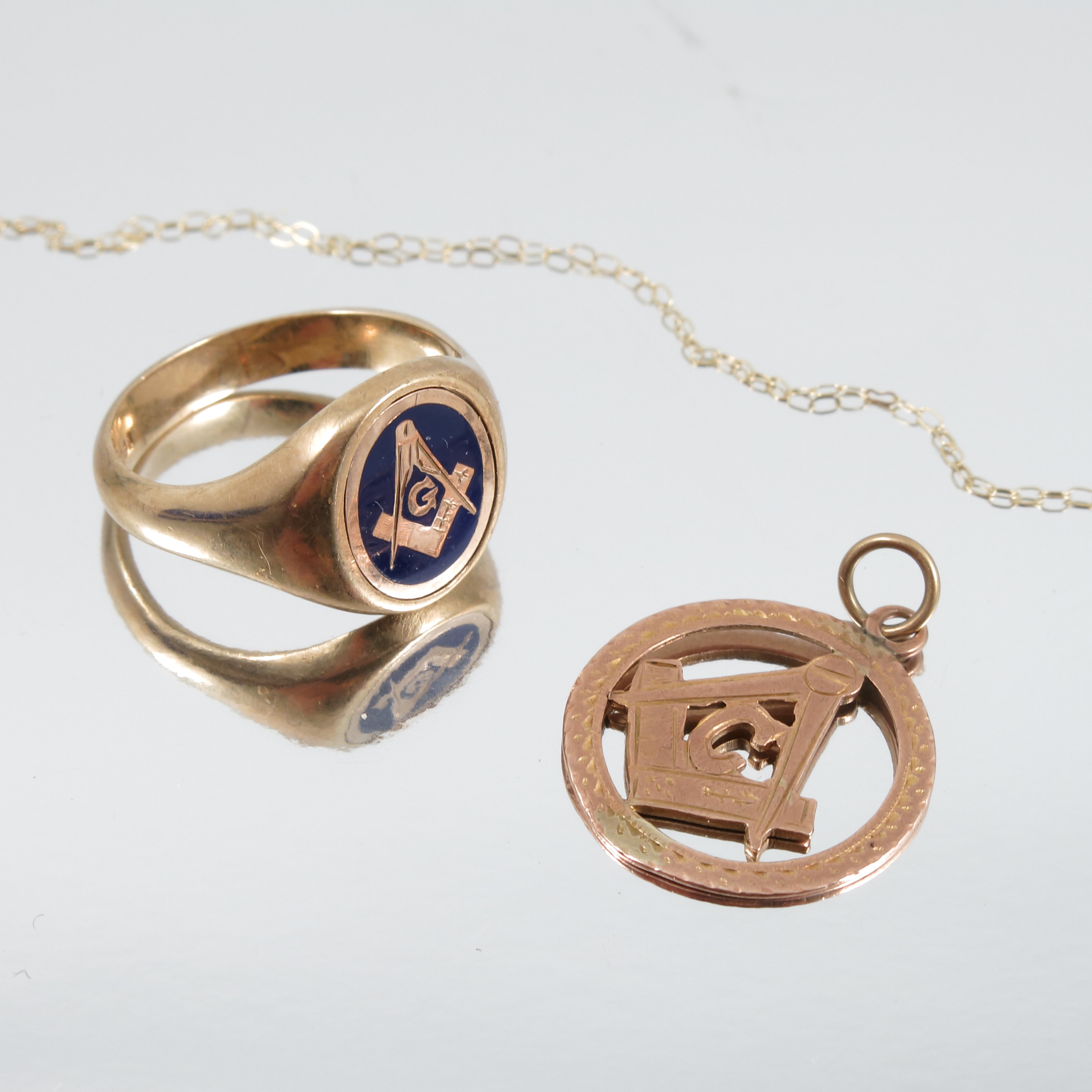 A 9 carat gold masonic swivel signet ring, monogrammed, finger size S, together with a 9 carat