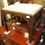 An oak Chippendale design stool, of rectangular form, with drop in seat, raised on carved legs