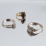 An 18ct gold stone set ring, together with two other rings