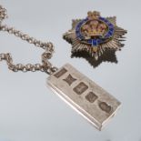 A hallmarked silver and enamel Royal Masonic Institute for Girls badge, B.M.I.G 1927, together