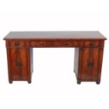 A 19th century mahogany pedestal sideboard, the top fitted with three frieze drawers, the