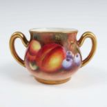 A Royal Worcester two handled miniature sugar box, decorated all around with fruit, possibly by