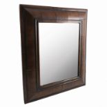 A 19th century mahogany cushion framed wall mirror, of rectangular form, plate size 15.5ins x 12.