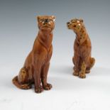 A pair of Mintons pottery models, of seated leopards, height 6.25insCondition Report: Condition