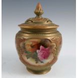 A Royal Worcester Hadleys covered vase, decorated with panels of flowers, shape number H171, dated