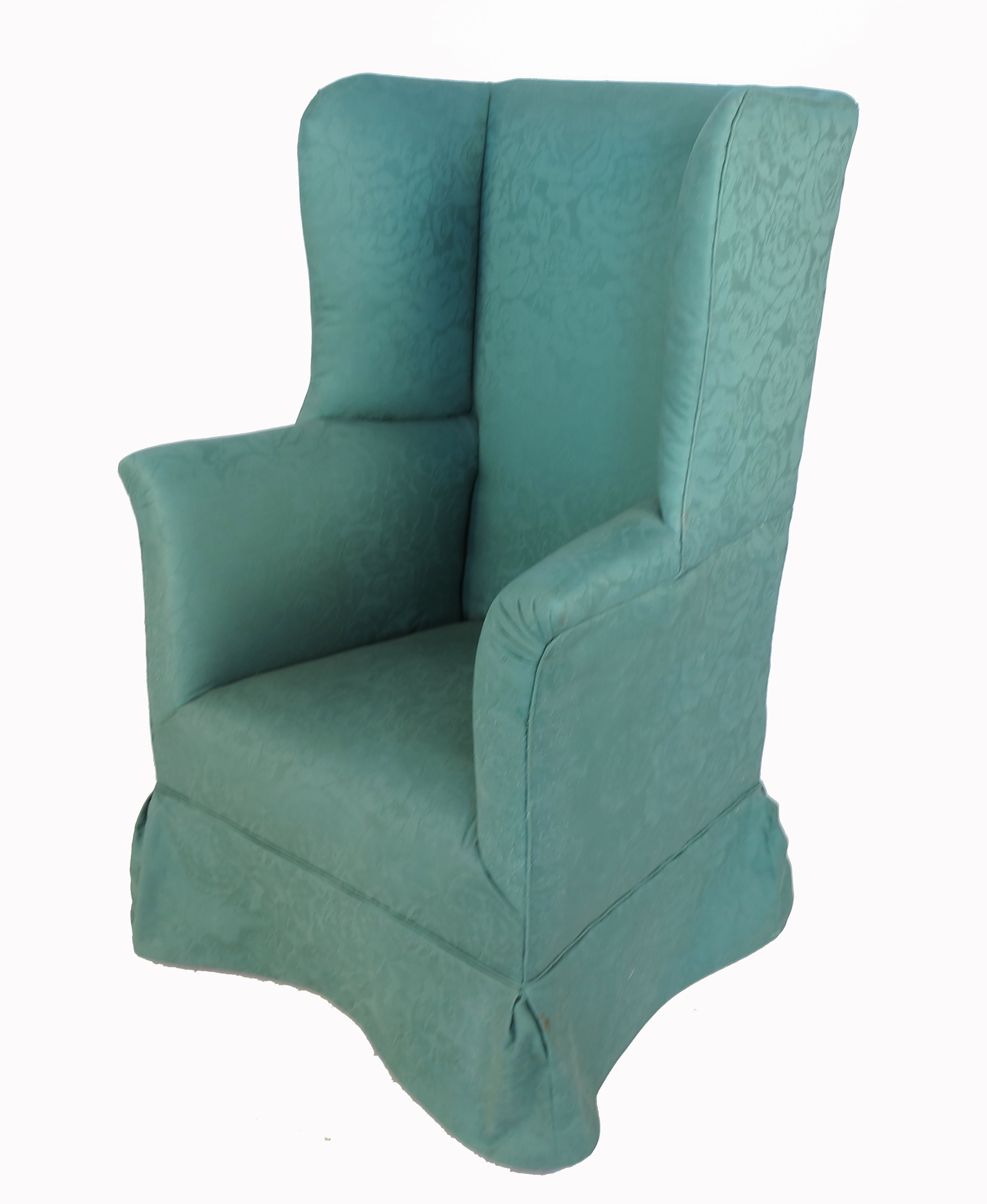 A Georgian design high back wing armchair, raised on front carved cabriole legs terminating in