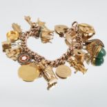 A 9 carat gold bracelet, of solid curb links, with sixteen charms attached including a Spade Guinea,