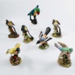 Six Crown Staffordshire models of birds, all modelled by J T Jones, together with a Crown