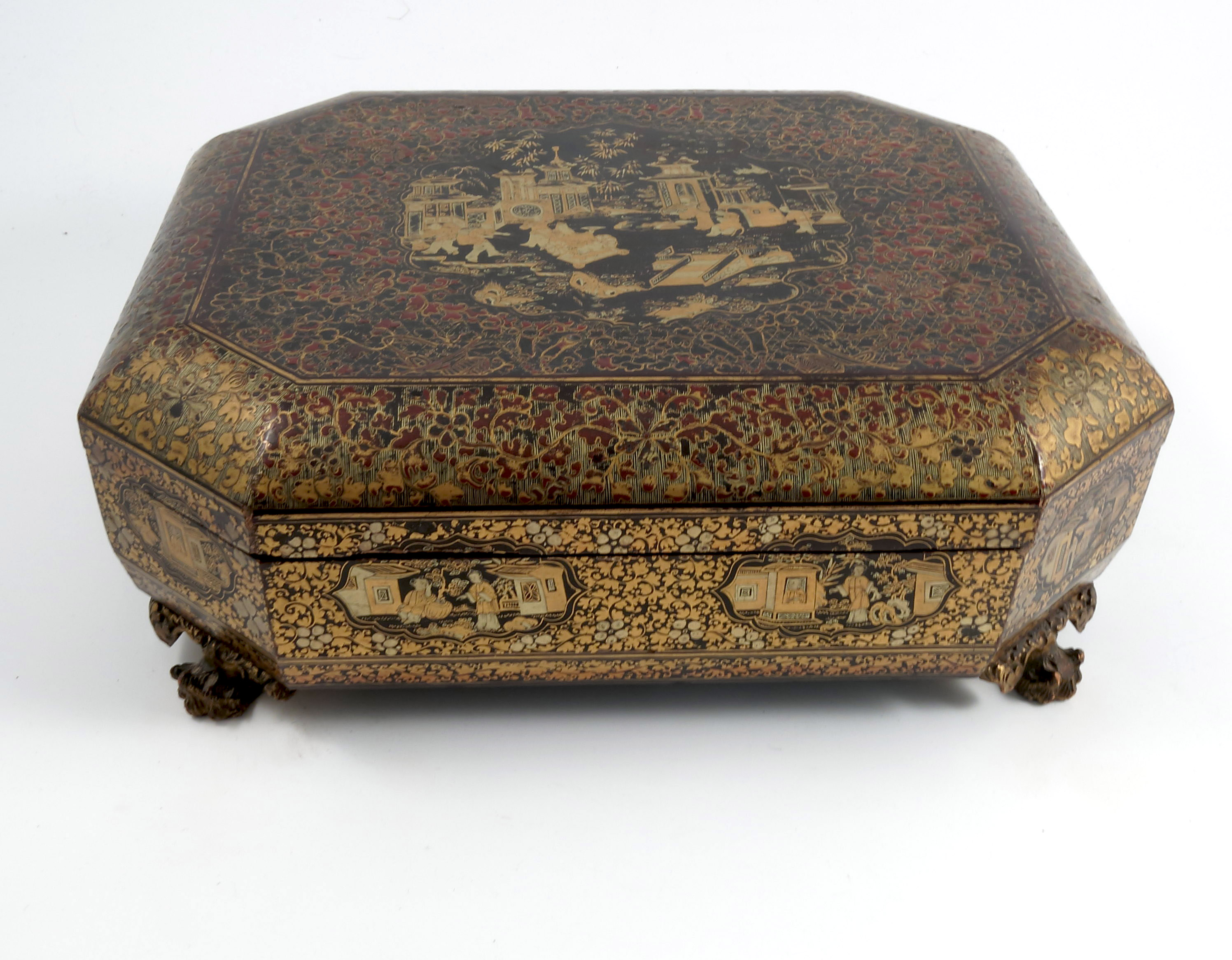 A 19th century Oriental black lacquer and gilt games box, of octagonal form, the lid and sides