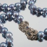 A uniform row of grey baroque cultured pearls, the seventy one pearls of approximately 8mm diameter,