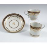 A Barr Worcester coffee can, tea cup and saucer, decorated in blue and gilt, scratch B mark on