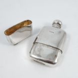 A silver hip flask, with twist hinged cover, pull off cup to the base, engraved to the base with