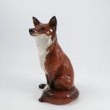 Beswick model, of a seated fox, height 12.5insCondition Report: Condition commensurate with age