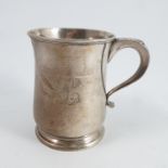 A silver pint mug, of baluster form, engraved with initials, Sheffield 1932, weight 10oz,