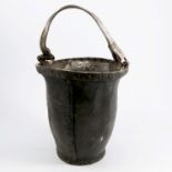 An Antique leather fire bucket, with metal straps and leather handle, height 11ins