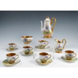 A Royal Worcester coffee set, comprising coffee pot, milk jug, sugar bowl and six cups and