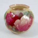 A Royal Worcester vase, of shaped circular form, decorated with roses to the front by M Hunt,