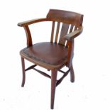 An early 20th century oak office chair