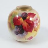 A Royal Worcester vase, of circular form, decorated with autumnal fruits and berries to the front by