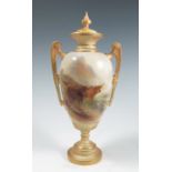 A Royal Worcester covered pedestal vase, decorated with two Highland cattle in landscape to the