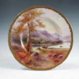 A Royal Worcester cabinet plate, decorated with a view of Lake Derwentwater by H Davis, to a