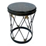 A circular occasional table, of drum shaped form, having a black marble top and raised on metal