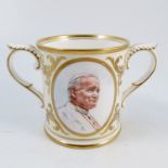 A Royal Worcester limited edition two handled commemorative loving mug, to commemorate the visit