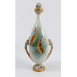 A Royal Worcester covered vase, decorated to the front and back with fish by H Davis, raised on a