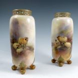 A pair of Royal Worcester cylindrical vases, with pierced rims, decorated with sheep in landscape to