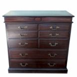 A 1920’s mahogany chest of drawers, with lift up lid revealing patented trouser press, Reg.