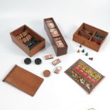 A collection of vintage games, to include bone and ebonised dominoes in a mahogany box with slide