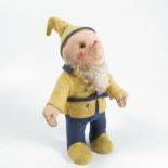 A felt gnome doll, in yellow and blue, with beard and a squeaker, height 9.5ins