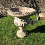 A garden urn, of classical form and decoration